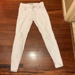 Ripped white skinny jeans